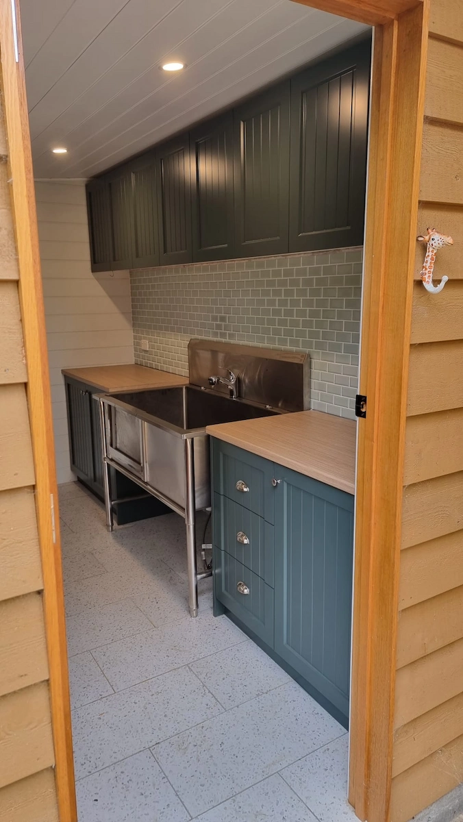 Eltham mud room and dog wash renovation by Northside Joinery, two-pack doors with custom joinery after strip-out