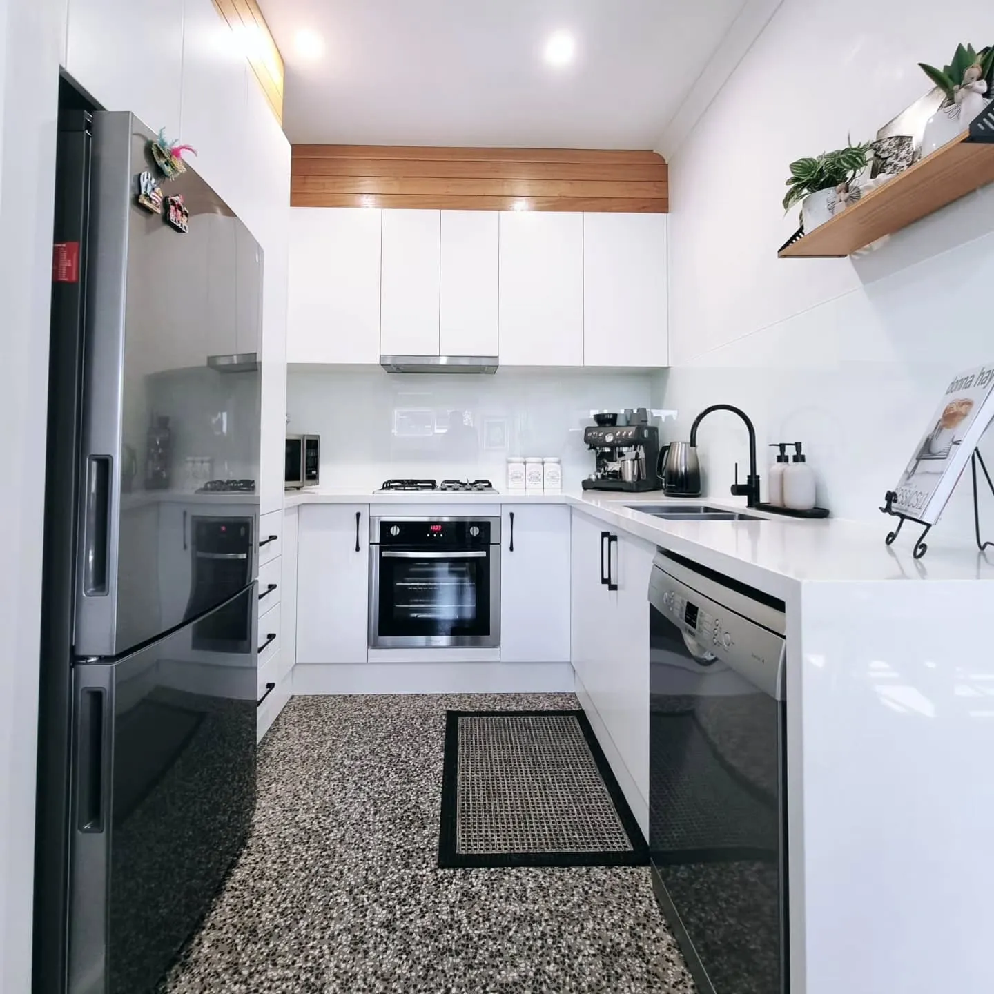 Custom kitchen with vinyl wrapped cabinet doors